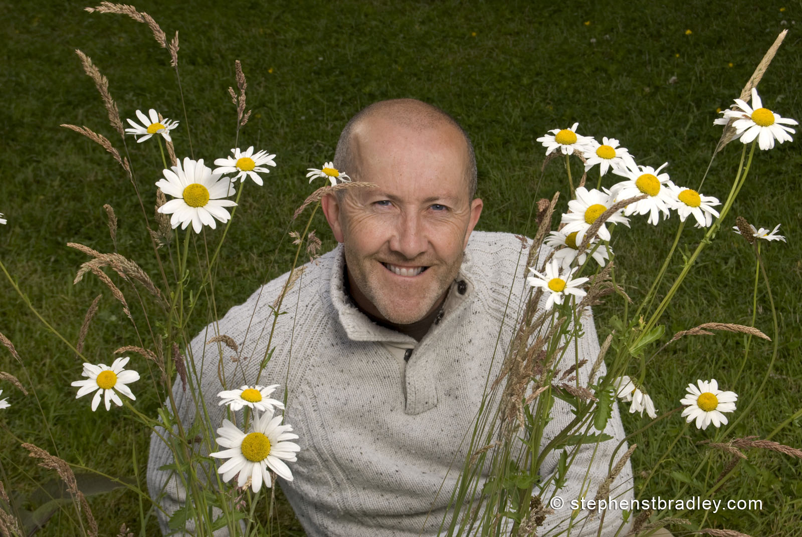 Landscape photographer Stephen S T Bradley photographed in his garden, in Newtownabbey on the northern edge of Belfast Northern ireland, with the flowering plants that bloomed from seeds Stephen requested from the BBC Countryfile / Kew Gardens Grow Wild seed planting project.