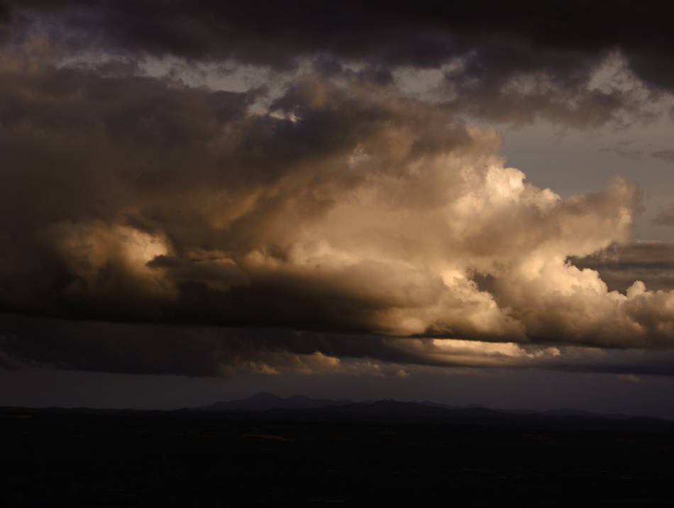 Mourne Mountains under Turneresque sky from the Cavehill, Belfast photo icon.