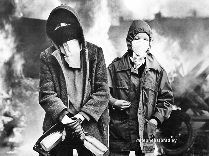 Hooded rioters, Divis Flats, Belfast, by Stephen S T Bradley, editorial, commercial, PR and advertising photographer, Dublin, Ireland