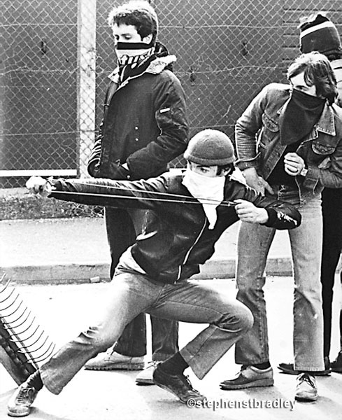 Rioter using catapult, Bogside, Derry, Northern Ireland, by Stephen S T Bradley, editorial, commercial, PR and advertising photographer, Dublin, Ireland