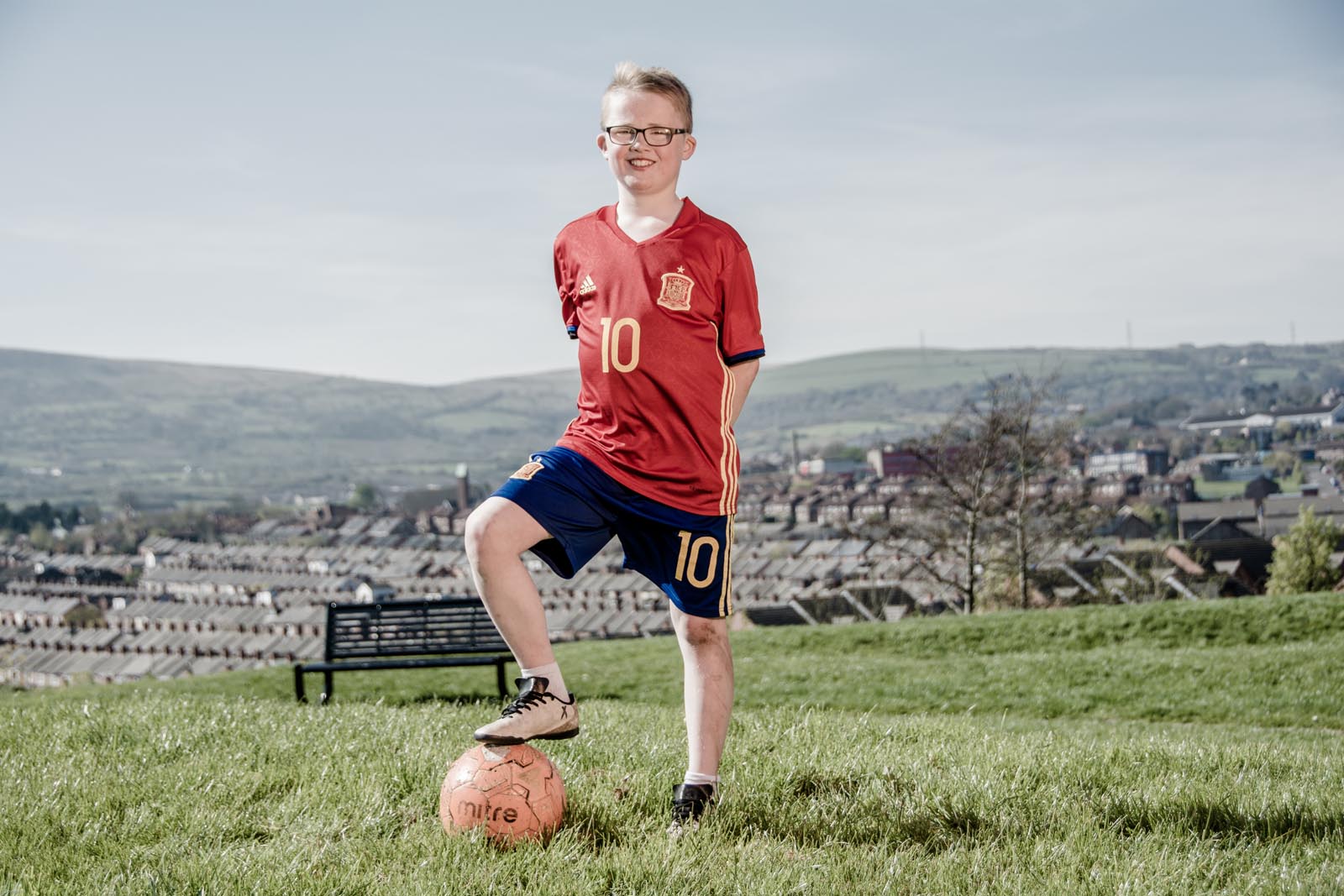 Boy wearing Spain football kit in park - photo 5343 by Stephen S T Bradley photographer Dublin and Belfast, Ireland