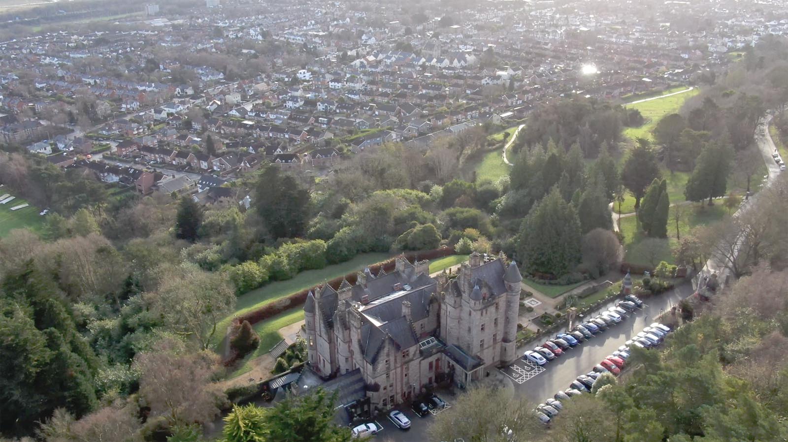 Aerial drone photography and video production services Dublin and Ireland portfolio - changing seasons in one video of Belfast Castle, Northern Ireland, video screenshot 3