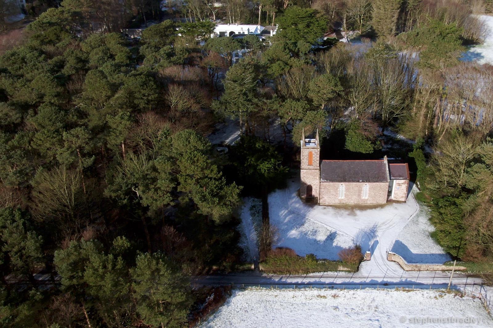 Aerial drone photography and video production services Dublin and Ireland portfolio - Cushendun village under snow in winter, video screenshot 1