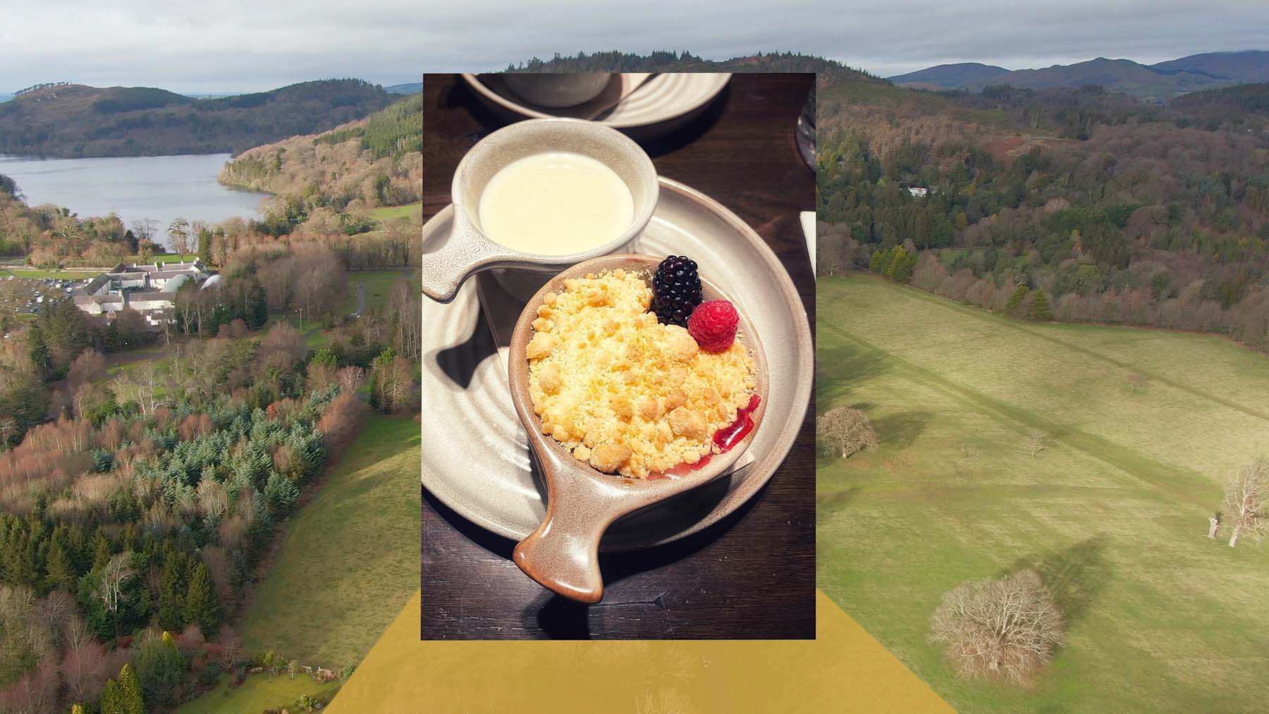 Video screenshot 3 showing photo of apple crumble and custard dessert overlaid on aerial footage of forest park from video by Stephen S T Bradley aerial hotel video production in the UK and Ireland