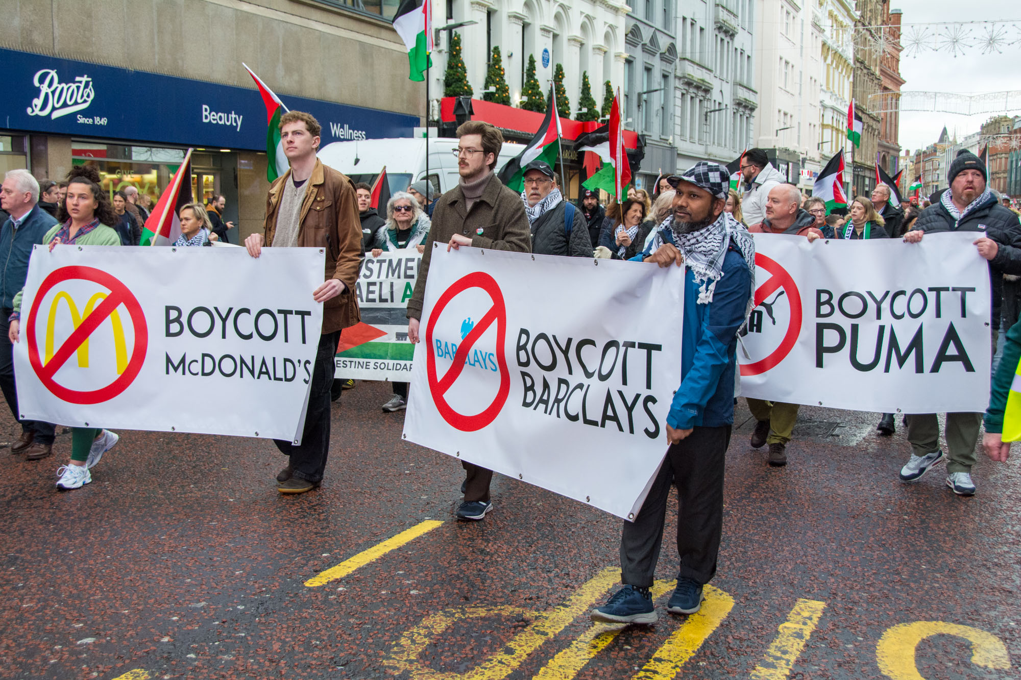 Boycott banners pictured at the Palestine march in Belfast. Photo 7663 by Stephen S T Bradley