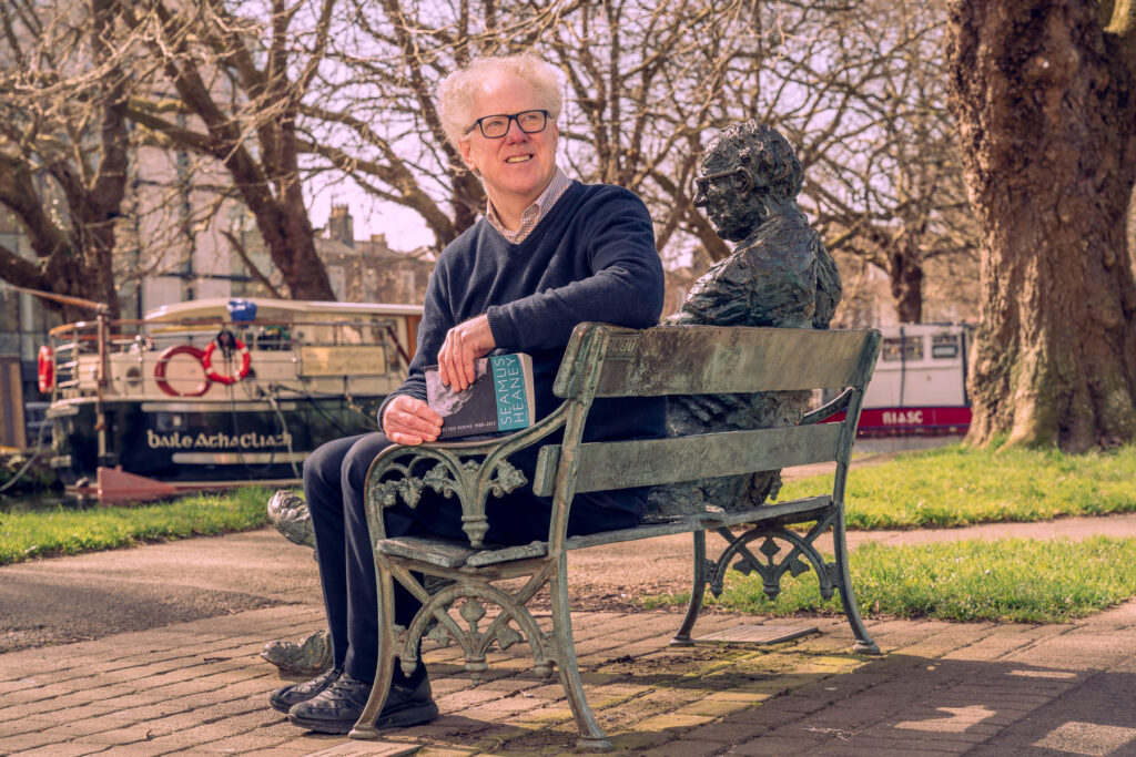 Irish author Ronan McGovern pictured beside the sculpture of Irish poet Patrick Kavanagh at the Grand Canal in Dublin, Ireland. Photo by Dublin and Belfast based commercial photographer and director Stephen S T Bradley